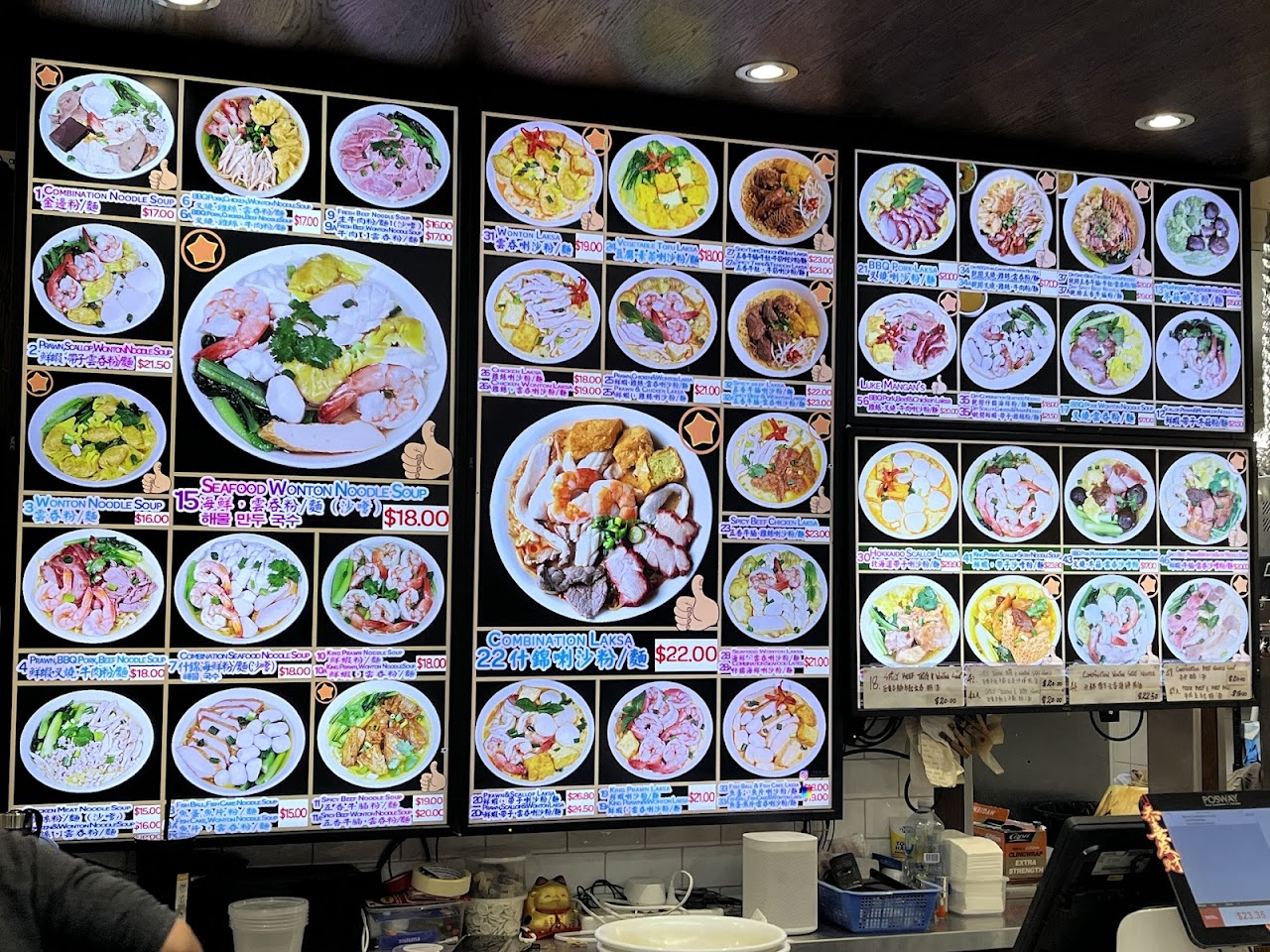 Happy Chef illuminated menu boards above the counter